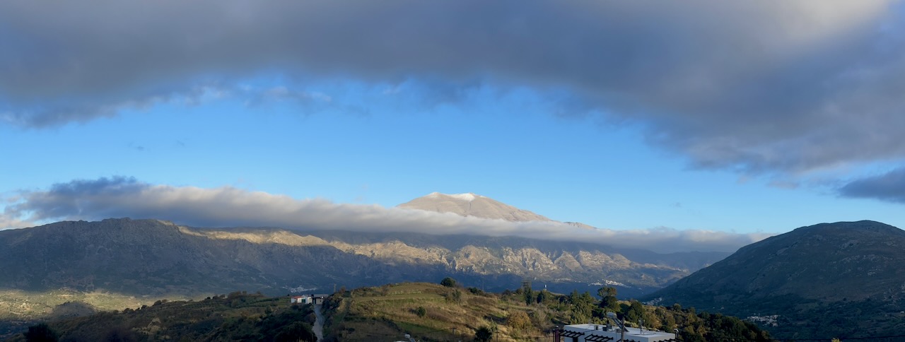 Mount Psiloritis with a cap of cloud at first light, seen from Meronas